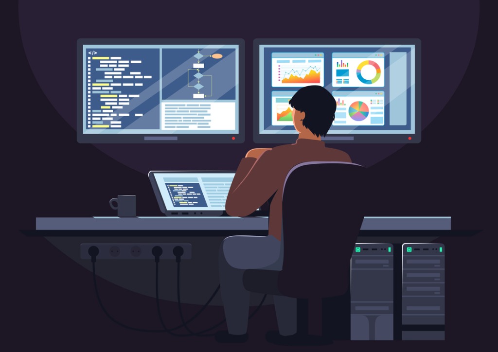 software developer working on laptop computer